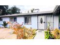 House exterior featuring a walkway and well-maintained landscaping at 4130 Balboa Ave, Las Vegas, NV 89121