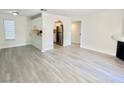 Open concept kitchen with stainless steel appliances and breakfast bar at 601 Cabrillo Cir # 1293, Henderson, NV 89015