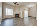 Spacious living room showcasing a fireplace and hardwood floors at 8805 Jeffreys St # 1115, Las Vegas, NV 89123