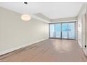 Bright living room with wood floors and sliding glass door with mountain views at 2700 Las Vegas Blvd # 3105, Las Vegas, NV 89109