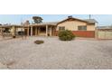 Ranch style home with carport and landscaped yard at 3766 Millwood Ave, Las Vegas, NV 89121