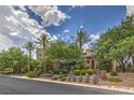 Modern home with palm trees and manicured landscaping at 583 Saint Croix St, Henderson, NV 89012