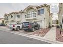 Townhouse with attached garage and parking in front at 6201 E Lake Mead Blvd # 238, Las Vegas, NV 89156