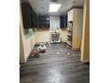 Kitchen undergoing renovation with new flooring at 725 Concrete Ct, Las Vegas, NV 89110