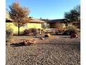 Desert landscaping surrounds this single-story home at 7415 Constantinople Ave, Las Vegas, NV 89129