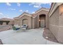 Front patio with seating area, adjacent to the home's entrance at 8044 Edward Baher Ave, Las Vegas, NV 89149