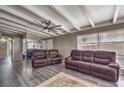 Living room with gray walls, hardwood floors, and two reclining sofas at 108 S Mallard St, Las Vegas, NV 89107