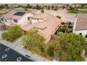 A beautiful aerial view reveals this single-story home's well-maintained landscaping and proximity to the golf course at 1172 Via Della Costrella, Henderson, NV 89011