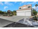 Charming two-story home features a three-car garage and well-maintained landscaping at 1812 Dalton Dr, Henderson, NV 89014