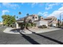 Two-story house with a three-car garage and landscaped yard at 1812 Dalton Dr, Henderson, NV 89014