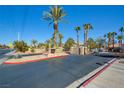 Landscaped gated entrance to the community at 1830 N Buffalo Dr # 1007, Las Vegas, NV 89128