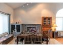 Bright dining room features a fireplace and large table with seating for six at 3008 Blue Fin Cir, Las Vegas, NV 89128