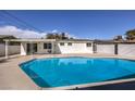 Inviting backyard oasis featuring a sparkling blue pool at 3012 Holly Hill Ave, Las Vegas, NV 89104