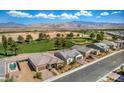 Community overview showcasing homes near a golf course and mountains at 4390 E Cactus Canyon Dr, Pahrump, NV 89061