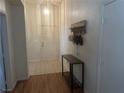 Bright entryway with wood-look floors and a console table at 5005 Prairie Springs Ct, Las Vegas, NV 89130