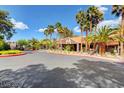 Community building with Spanish-style architecture and landscaping at 5006 S Rainbow Blvd # 103, Las Vegas, NV 89118