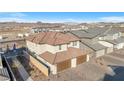 Aerial view of two-story house with two-car garage at 524 Celebratory Pl, Henderson, NV 89011