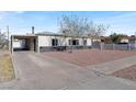 Newly remodeled home with a carport and landscaping at 649 Federal St, Henderson, NV 89015