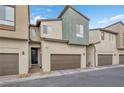 Contemporary townhome featuring two-car garage and sleek design at 9289 Casa Sierra Ln, Las Vegas, NV 89148