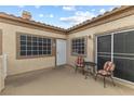 Private patio with table and chairs, ideal for relaxing at 1851 Hillpointe Rd # 2123, Henderson, NV 89074