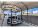 Covered RV parking with a metal carport structure at 303 Glasgow St, Henderson, NV 89015