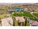 Luxury home nestled on a golf course with scenic lake views at 4 Bloomfield Hills Dr, Henderson, NV 89052