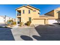 Two-story house with attached garage and landscaping at 4530 Lime Straight Dr, Las Vegas, NV 89115