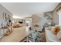 Spacious living room with tiled floors and neutral color palette at 1125 Neva Ranch Ave, North Las Vegas, NV 89081