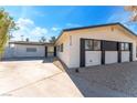 Newly remodeled home with a two-car garage and modern curb appeal at 2113 La Harve Dr, Las Vegas, NV 89106