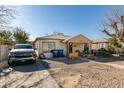 Single-story home with gravel driveway and small front yard at 2116 Poplar Ave, Las Vegas, NV 89101