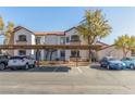 Two story building with covered parking and landscaping at 2615 W Gary Ave # 1069, Las Vegas, NV 89123