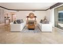 Elegant living room featuring modern sofas and a large mirror at 2857 Paradise Rd # 1901, Las Vegas, NV 89109