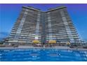 High-rise building with swimming pool; luxury high rise condo building at 3111 Bel Air Dr # 18F, Las Vegas, NV 89109