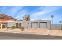 Single story home with three car garage and mountain views at 505 Ville Dr, Boulder City, NV 89005