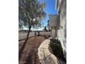 Attractive landscaping around the exterior of the home at 5201 S Torrey Pines Dr # 1244, Las Vegas, NV 89118