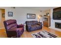 Living room featuring a fireplace and comfortable seating at 7037 Pleasant View Ave, Las Vegas, NV 89147