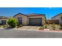 Single-story home with attached garage and well-manicured landscaping at 9016 Skye Canyon Ranch St, Las Vegas, NV 89166