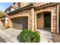 Front entrance with stonework and landscaping at 10588 El Cerrito Chico St, Las Vegas, NV 89179