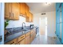 Renovated kitchen with modern cabinets and countertops at 107 Manganese St, Henderson, NV 89015