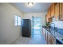 Kitchen with stainless steel appliances and back door at 107 Manganese St, Henderson, NV 89015