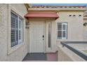 Condo building entrance with red awning at 220 E Flamingo Rd # 426, Las Vegas, NV 89169