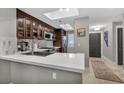 Modern kitchen with stainless steel appliances and white countertops at 220 E Flamingo Rd # 426, Las Vegas, NV 89169