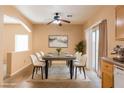 Elegant dining area with a modern table and six chairs at 2915 Rippling Springs St, Laughlin, NV 89029