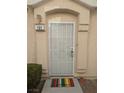 Inviting front door entrance with security gate at 3031 Errol Flynn St # 101, Las Vegas, NV 89122