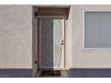 Front door entrance with security door and welcome mat at 5916 Naperville St, Las Vegas, NV 89130