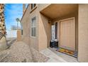 Front door entry with welcome mat and decor at 7908 Mountain Point Ave, Las Vegas, NV 89131