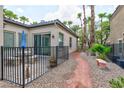 Private backyard with patio and walkway at 1045 Via Camelia St, Henderson, NV 89011