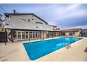 Backyard pool featuring a minimalist design and direct access to home via sliding glass doors at 1420 S 8Th St, Las Vegas, NV 89104