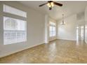 Bright living room with tile floors and neutral walls at 5055 Jacarilla Ln, North Las Vegas, NV 89031
