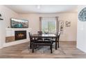 Cozy dining area with fireplace and built-in shelving at 6701 Squaw Mountain Dr # 203, Las Vegas, NV 89130